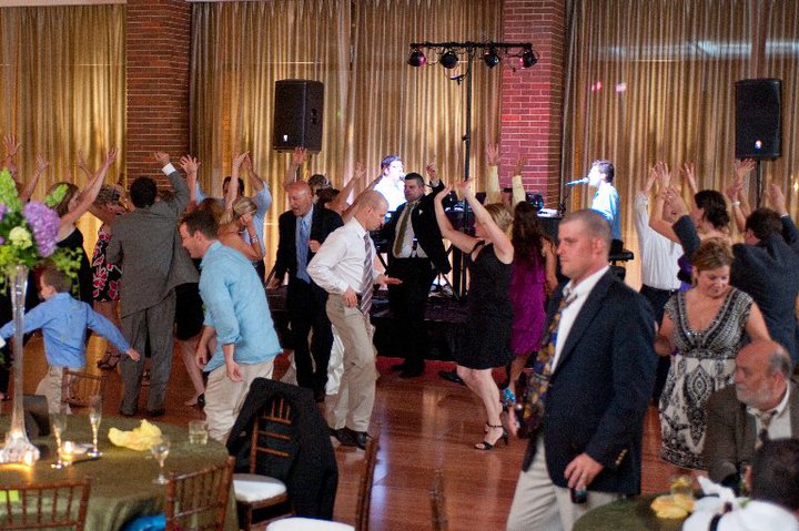 Guests dancing during an interactive dueling piano event
